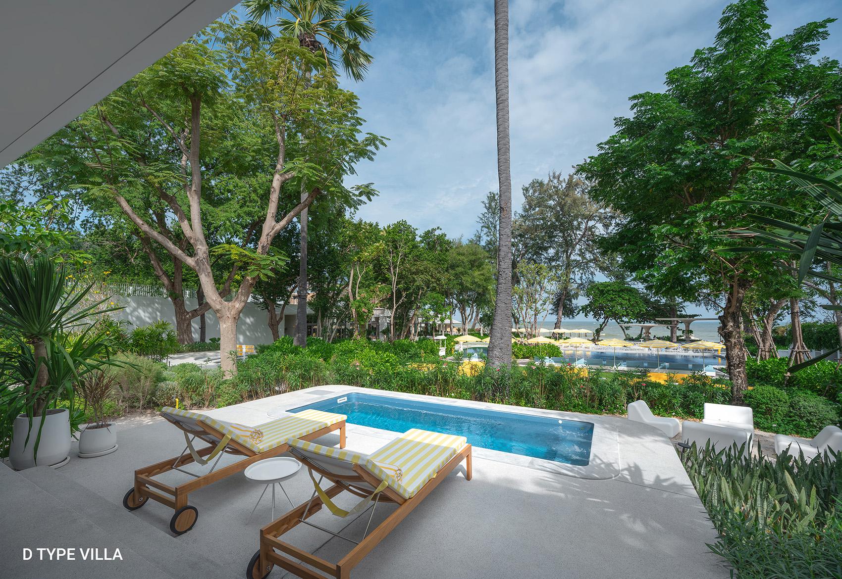 Private swimming pool and landscaped garden at the Type D Family Estate